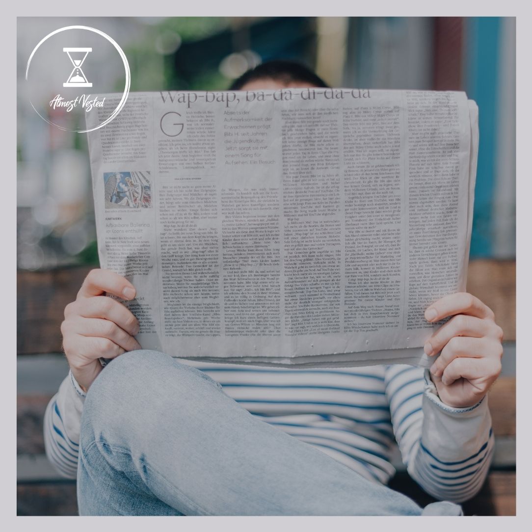 Man Reading Newspaper